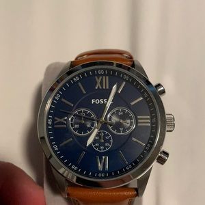Navy blue face, brown band. Fossil Watch